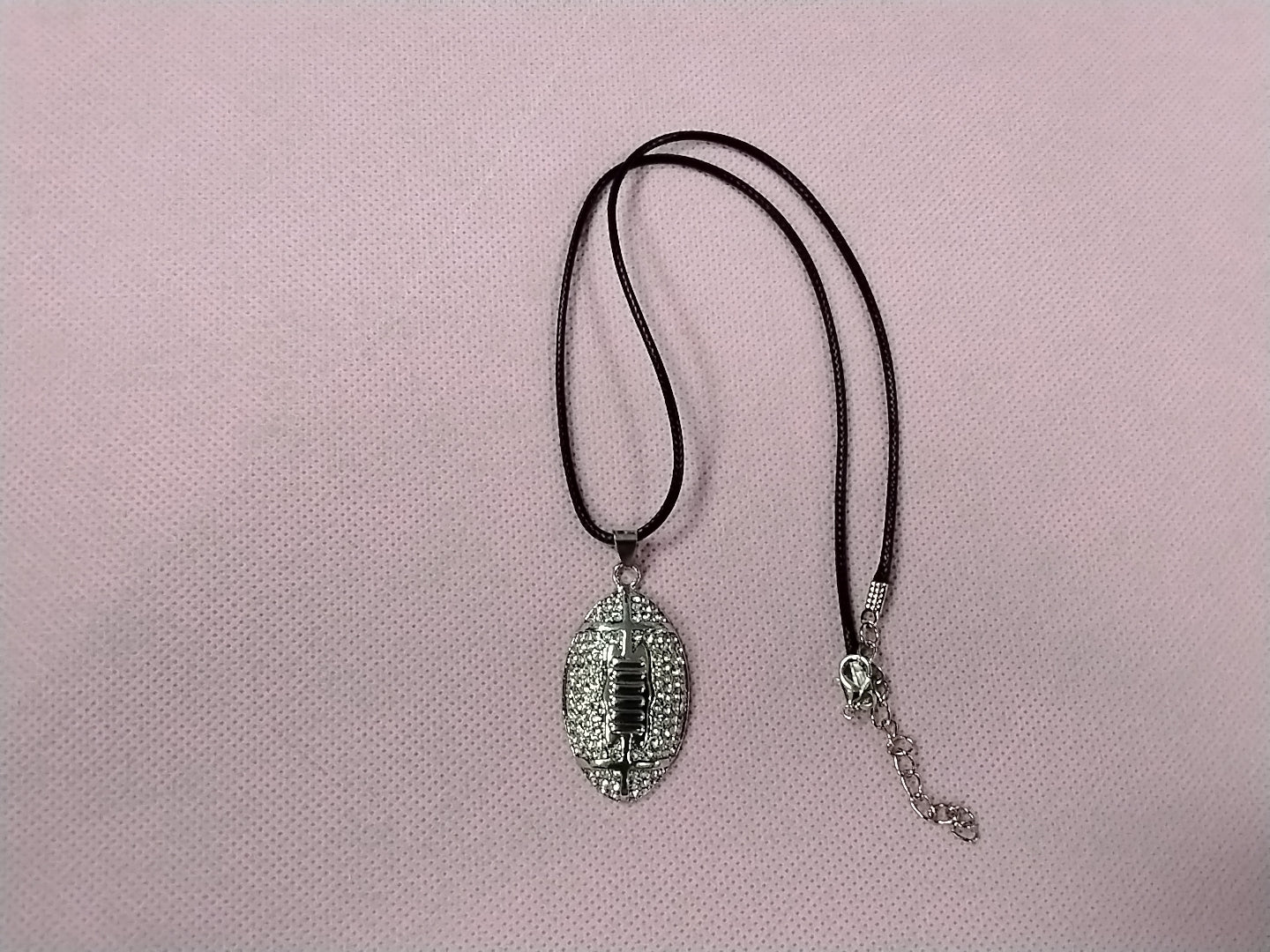 Silver football necklace