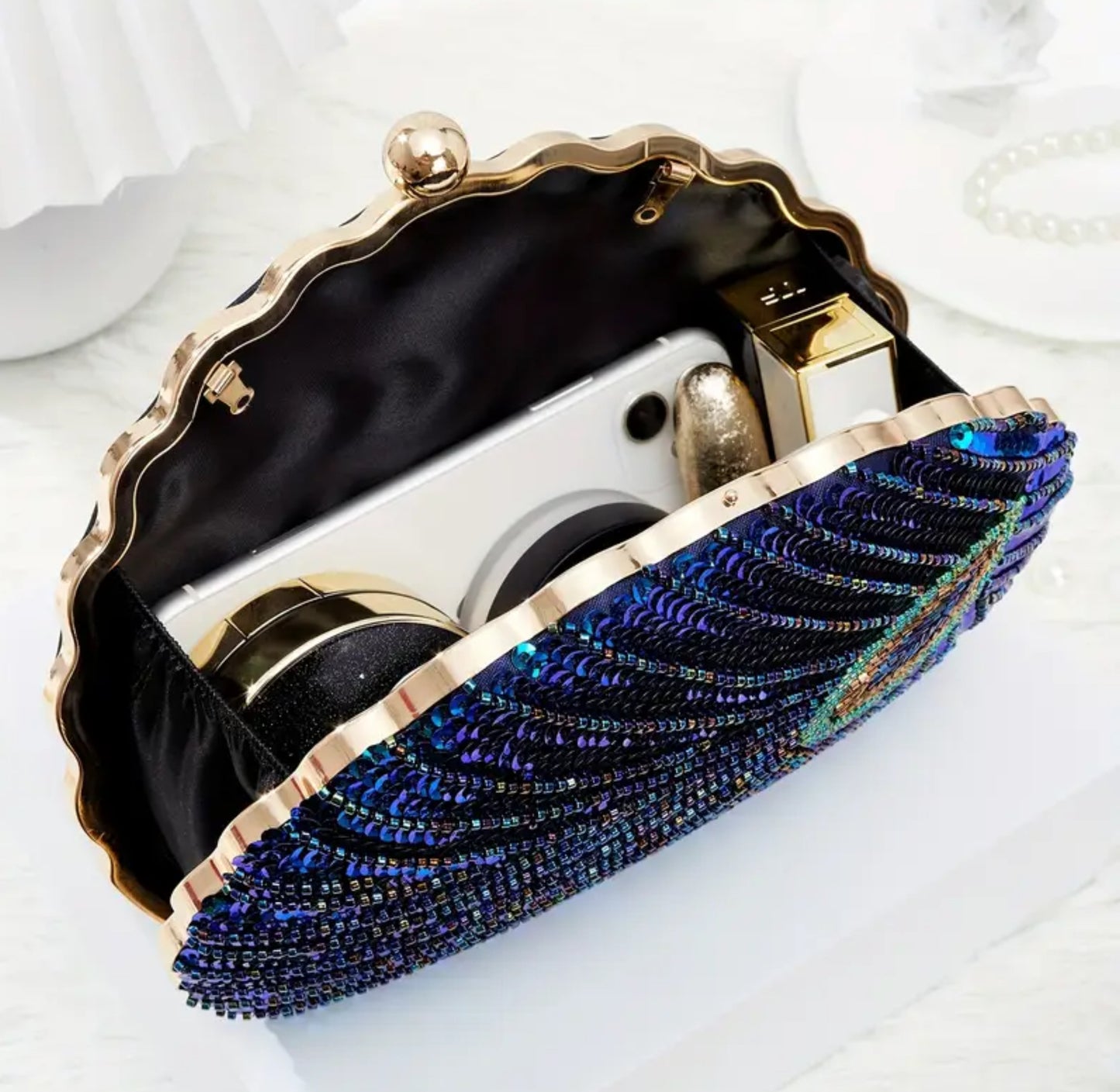 Evening Peacock Feather Clutch