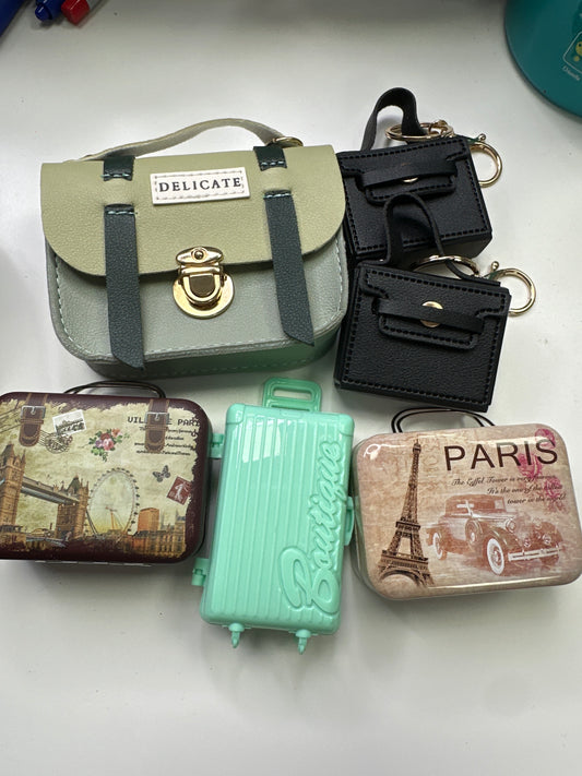 Mystery mini suit cases Accesorios