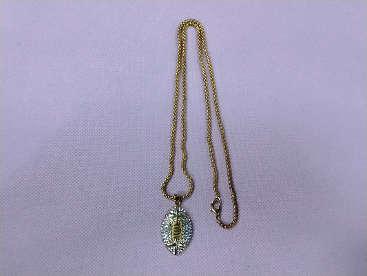 Gold football necklace
