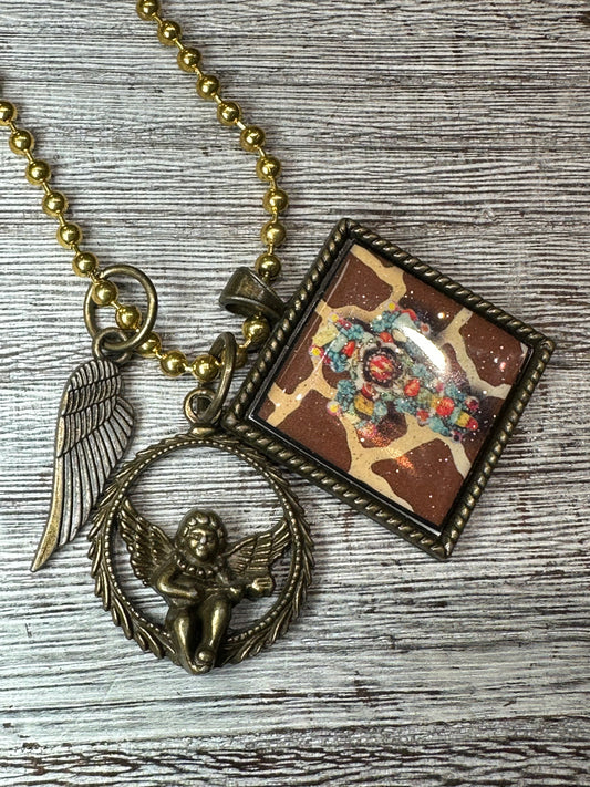 Red bejeweled Angel cross necklace